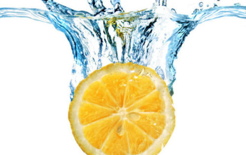 refreshing splashed lemon slice