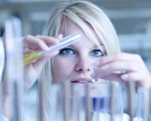 Woman chemist experimenting